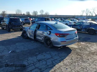 2023 Honda Civic Sport z VIN 2HGFE2F50PH550459, wystawiony jako IAAI lot #41757956 z przebiegiem 48 456 mil mil oraz . Historia ofert i sprzedaży dostępna na DreamBid. Obrazek 3.