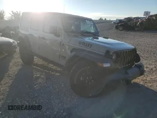 2022 Jeep Wrangler Unlimited Willys with VIN 1C4HJXDNXNW267388, listed as a Copart auction lot 72142634 with 23,631 mi miles and Salvage Title. Bid and sale history available at DreamBid. Image 4.