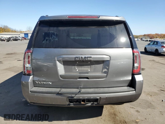 2019 GMC Yukon SLE with VIN 1GKS2AKC4KR334387, listed as a Copart auction lot 77267774 with 62,821 mi miles and Salvage Title. Bid and sale history available at carsss.com. Image 6.