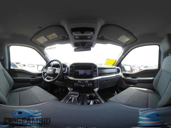 2023 Ford F-150 Lightning Pro with VIN 1FTVW1EL8PWG33656, listed as a IAAI auction lot 42260659 with 22,490 mi miles and . Bid and sale history available at DreamBid. Image 18.
