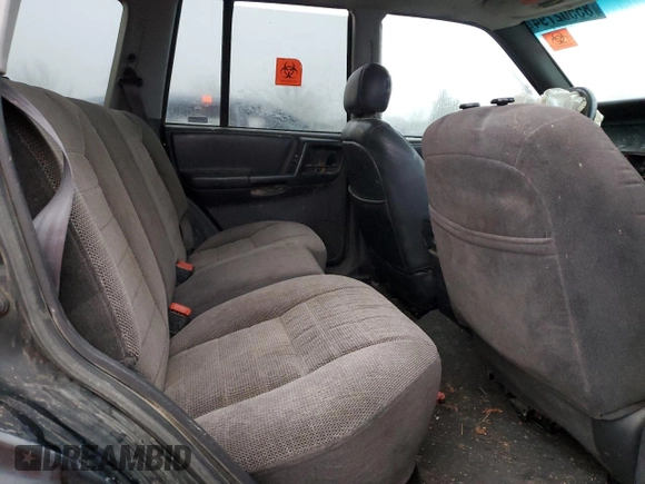 1998 Jeep Grand Cherokee Laredo with VIN 1J4GZ48S0WC171138, listed as a Copart auction lot 85502794 with 0 mi miles and Salvage Title. Bid and sale history available at carsss.com. Image 12.