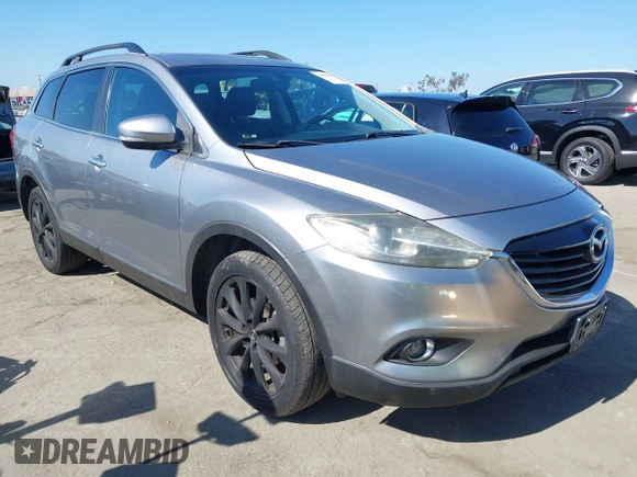 2014 Mazda CX-9 Grand Touring z VIN JM3TB3DV9E0437380, wystawiony jako IAAI lot #42298066 z przebiegiem 169 644 mil mil oraz . Historia ofert i sprzedaży dostępna na DreamBid. Obrazek 1.
