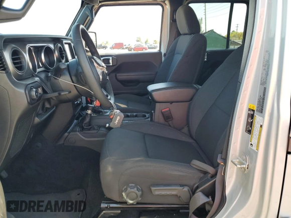 2023 Jeep Wrangler Willys with VIN 1C4HJXDNXPW702199, listed as a Copart auction lot 53815985 with 24,943 mi miles and Clean Title. Bid and sale history available at DreamBid. Image 7.
