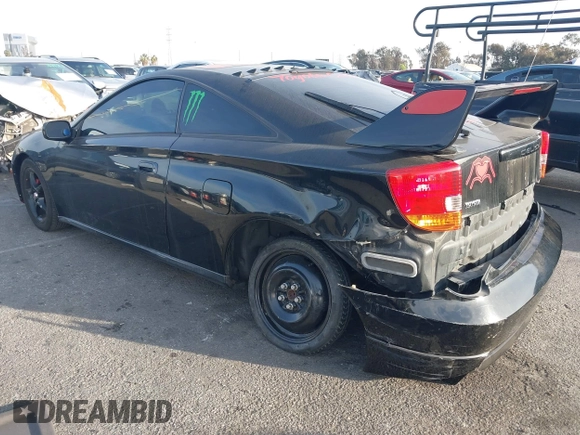 2002 Toyota Celica GTS with VIN JTDDY32T520060166, listed as a IAAI auction lot 41598643 with 116,983 mi miles. Bid and sale history available at carsss.com. Image 3.