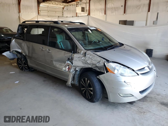 2010 Toyota Sienna XLE with VIN 5TDYK4CCXAS323450, listed as a Copart auction lot 62491545 with 220,121 mi miles and Salvage title. Bid and sale history available at DreamBid. Image 4.