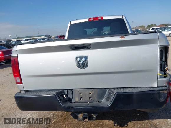 2014 Ram 1500 Tradesman with VIN 1C6RR6FG8ES314972, listed as a IAAI auction lot 41563554 with 233,285 mi miles and . Bid and sale history available at DreamBid. Image 16.