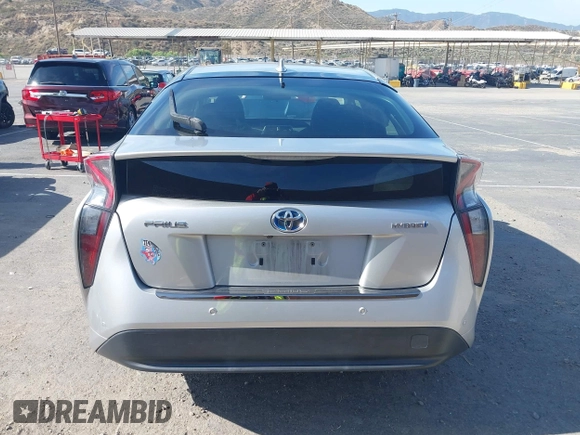 2017 Toyota Prius Two with VIN JTDKBRFU8H3048082, listed as a IAAI auction lot 42496637 with 104,302 mi miles and . Bid and sale history available at DreamBid. Image 16.