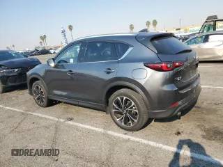 2023 Mazda CX-5 2.5 S Premium Plus Package with VIN JM3KFBEM6P0185977, listed as a Copart auction lot 87872585 with 28,568 mi miles and Salvage Title. Bid and sale history available at carsss.com. Image 2.