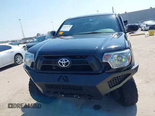 2014 Toyota Tacoma PreRunner with VIN 3TMKU4HN0EM040104, listed as a IAAI auction lot 41619179 with 171,542 mi miles and . Bid and sale history available at DreamBid. Image 12.