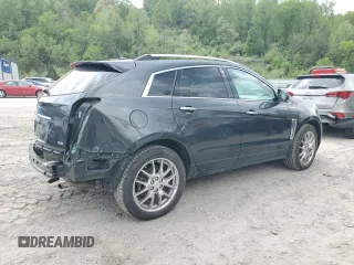 2014 Cadillac SRX Premium Collection with VIN 3GYFNGE3XES560903, listed as a Copart auction lot 52529525 with 117,780 mi miles and Salvage title. Bid and sale history available at DreamBid. Image 3.