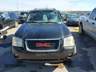 2003 GMC Envoy SLE with VIN 1GKDS13S732134354, listed as a IAAI auction lot 41305506 with 221,733 mi miles. Bid and sale history available at carsss.com. Image 12.