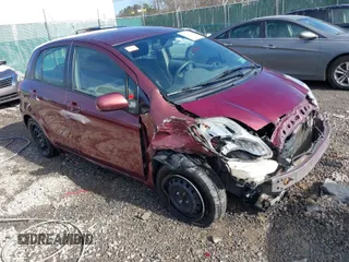 2010 Toyota Yaris with VIN JTDKT4K35A5288732, listed as a IAAI auction lot 41694379 with 169,147 mi miles. Bid and sale history available at carsss.com. Image 1.