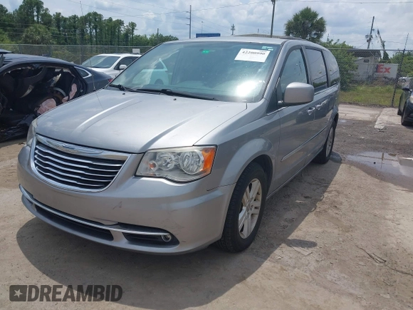 2016 Chrysler Town & Country Touring with VIN 2C4RC1BG4GR193462, listed as a IAAI auction lot 42200990 with 140,430 mi miles. Bid and sale history available at carsss.com. Image 2.