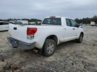 2012 Toyota Tundra 2WD Truck with VIN 5TFRM5F1XCX044799, listed as a Copart auction lot 80396204 with 254,642 mi miles and Clean Title. Bid and sale history available at carsss.com. Image 3.
