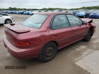 1996 Subaru Impreza with VIN JF1GC4557TH512593, listed as a Copart auction lot 74099464 with 112,437 mi miles and Salvage title. Bid and sale history available at DreamBid. Image 3.