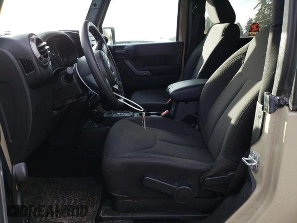 2017 Jeep Wrangler Willys Wheeler with VIN 1C4AJWAG8HL604146, listed as a Copart auction lot 79485174 with 24,888 mi miles and Salvage Title. Bid and sale history available at DreamBid. Image 7.