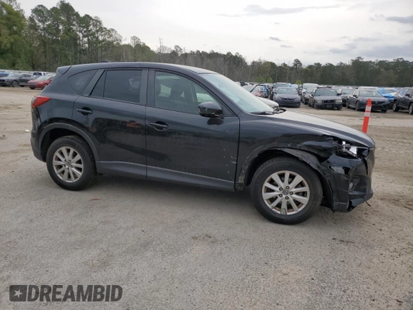 2015 Mazda CX-5 Touring with VIN JM3KE4CY5F0441691, listed as a Copart auction lot 50604835 with 182,886 mi miles and Salvage Title. Bid and sale history available at DreamBid. Image 4.