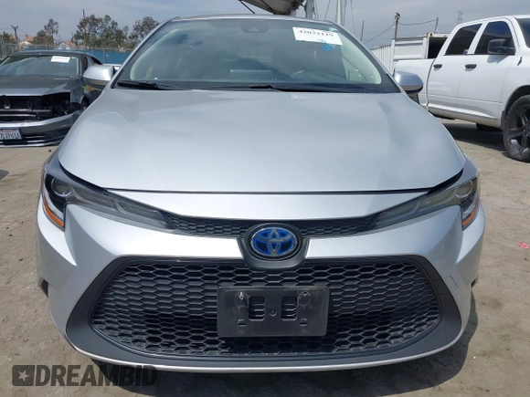 2022 Toyota Corolla Hybrid LE with VIN JTDEAMDE6NJ056705, listed as a IAAI auction lot 42032119 with 197,030 mi miles. Bid and sale history available at carsss.com. Image 12.