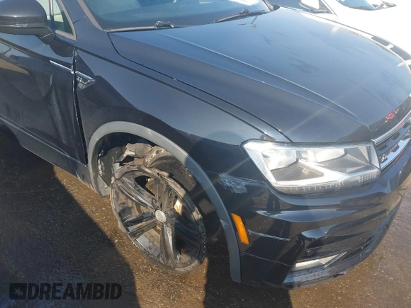 2019 Volkswagen Tiguan SE z VIN 3VV3B7AX3KM135261, wystawiony jako IAAI lot #42600904 z przebiegiem 62 026 mil mil oraz . Historia ofert i sprzedaży dostępna na DreamBid. Obrazek 19.