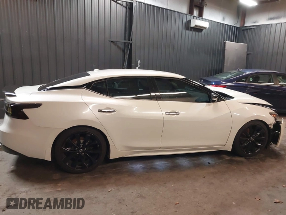 2016 Nissan Maxima SL with VIN 1N4AA6AP2GC439621, listed as a IAAI auction lot 41745052 with 23,484 mi miles and . Bid and sale history available at DreamBid. Image 13.