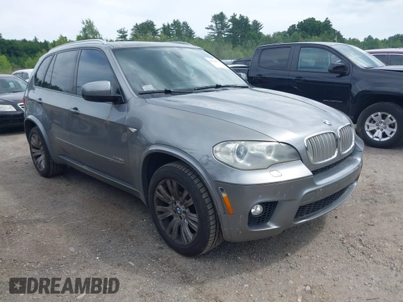 2013 BMW X5 xDrive50i with VIN 5UXZV8C52D0C15272, listed as a IAAI auction lot 42644739 with 169,393 mi miles and . Bid and sale history available at DreamBid. Image 1.