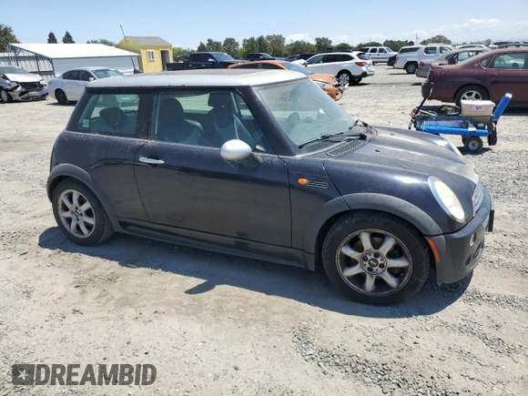 2006 MINI Hardtop with VIN WMWRC33516TK73752, listed as a Copart auction lot 62053245 with 126,836 mi miles and Clean title. Bid and sale history available at DreamBid. Image 4.