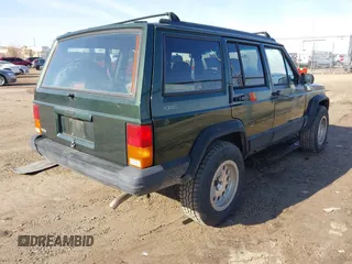 1996 Jeep Cherokee Sport with VIN 1J4FJ68S2TL299150, listed as a IAAI auction lot 41932867 with 142,761 mi miles. Bid and sale history available at carsss.com. Image 4.