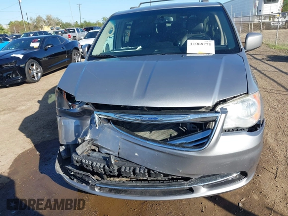2014 Chrysler Town & Country Touring with VIN 2C4RC1BGXER270140, listed as a IAAI auction lot 41068771 with 144,820 mi miles. Bid and sale history available at carsss.com. Image 12.