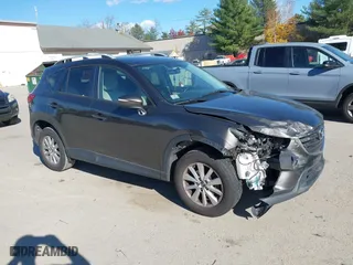 2016 Mazda CX-5 Touring with VIN JM3KE4CY7G0712560, listed as a IAAI auction lot 40708615 with 129,571 mi miles. Bid and sale history available at carsss.com. Image 1.