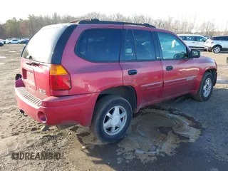 2002 GMC Envoy SLT with VIN 1GKDT13S222517064, listed as a IAAI auction lot 41590087 with 312,164 mi miles. Bid and sale history available at carsss.com. Image 4.