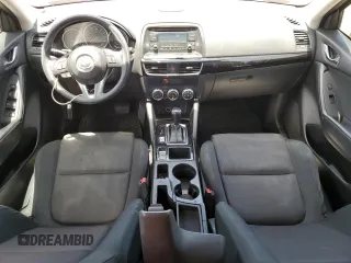 2016 Mazda CX-5 Sport с VIN JM3KE2BY4G0638102, выставлен на аукционе Copart как лот 56724445 с пробегом 189 235 миль миль и Списание • Salvage title. История ставок и продаж доступна на DreamBid. Изображение 8.