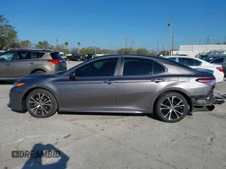2020 Toyota Camry SE z VIN 4T1G11AK2LU392182, wystawiony jako IAAI lot #41667278 z przebiegiem 41 506 mil mil oraz . Historia ofert i sprzedaży dostępna na DreamBid. Obrazek 14.