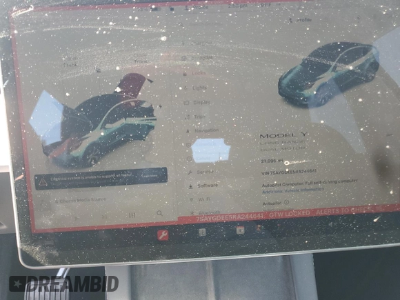 2024 Tesla Model Y Long Range z VIN 7SAYGDEE5RA244641, wystawiony jako Copart lot #51864845 z przebiegiem 23 096 mil mil oraz Szkoda całkowita • Salvage title. Historia ofert i sprzedaży dostępna na DreamBid. Obrazek 9.