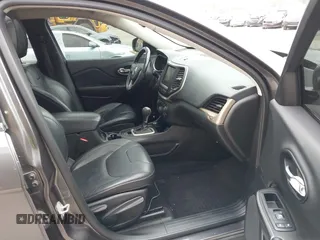 2014 Jeep Cherokee Limited z VIN 1C4PJMDB2EW182111, wystawiony jako IAAI lot #42179182 z przebiegiem 156 257 mil mil oraz . Historia ofert i sprzedaży dostępna na DreamBid. Obrazek 5.