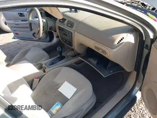 2004 Ford Taurus SE z VIN 1FAFP53U74A135287, wystawiony jako IAAI lot #40756396 z przebiegiem 141 483 mil mil oraz . Historia ofert i sprzedaży dostępna na DreamBid. Obrazek 5.