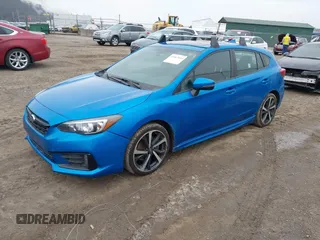 2023 Subaru Impreza Sport with VIN 4S3GTAM68P3721282, listed as a IAAI auction lot 41567014 with 39,700 mi miles. Bid and sale history available at carsss.com. Image 2.