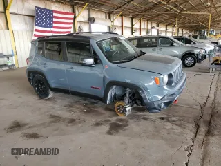 2018 Jeep Renegade Trailhawk with VIN ZACCJBCB9JPH79512, listed as a Copart auction lot 52190995 with 55,121 mi miles and Salvage title. Bid and sale history available at DreamBid. Image 4.