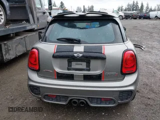 2017 MINI Hardtop 4 Door Cooper S z VIN WMWXU3C58H2D33073, wystawiony jako IAAI lot #41913081 z przebiegiem 51 631 mil mil oraz . Historia ofert i sprzedaży dostępna na DreamBid. Obrazek 17.