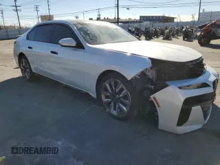 2023 BMW 7 Series 740i with VIN WBA23EH03PCM72085, listed as a Copart auction lot 87090954 with 0 mi miles and Salvage Title. Bid and sale history available at carsss.com. Image 4.