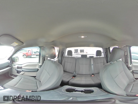2019 Ford F-150 XL with VIN 1FTEX1EP9KKC47098, listed as a Copart auction lot 60653275 with 104,823 mi miles and Salvage title. Bid and sale history available at DreamBid. Image 14.