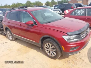 2018 Volkswagen Tiguan SEL z VIN 3VV3B7AX9JM054814, wystawiony jako IAAI lot #42394400 z przebiegiem 92 160 mil mil oraz . Historia ofert i sprzedaży dostępna na DreamBid. Obrazek 1.