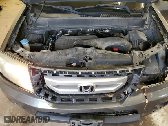 2011 Honda Pilot EX-L z VIN 5FNYF4H62BB040649, wystawiony jako Copart lot #56699035 z przebiegiem 192 874 mil mil oraz Szkoda całkowita • Salvage title. Historia ofert i sprzedaży dostępna na DreamBid. Obrazek 12.