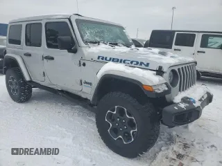2022 Jeep Wrangler Unlimited Rubicon with VIN 1C4JJXR63NW264609, listed as a Copart auction lot 88148715 with 33,308 mi miles and Salvage title. Bid and sale history available at DreamBid. Image 4.