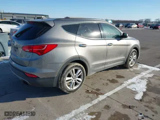 2013 Hyundai Santa Fe 2.0T Sport with VIN 5XYZUDLA0DG070122, listed as a IAAI auction lot 41413515 with 126,158 mi miles. Bid and sale history available at carsss.com. Image 4.