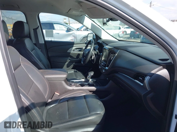 2021 Chevrolet Traverse RS z VIN 1GNEVJKW0MJ266088, wystawiony jako IAAI lot #41504928 z przebiegiem 57 966 mil mil oraz . Historia ofert i sprzedaży dostępna na DreamBid. Obrazek 5.