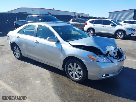 2007 Toyota Camry CE with VIN JTNBE46K973037322, listed as a IAAI auction lot 41461438 with 153,723 mi miles. Bid and sale history available at carsss.com. Image 1.