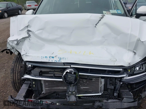 2022 Volkswagen Tiguan SE z VIN 3VV2B7AX8NM109450, wystawiony jako IAAI lot #42248707 z przebiegiem 18 603 mil mil oraz . Historia ofert i sprzedaży dostępna na DreamBid. Obrazek 10.