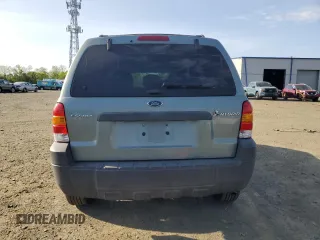 2005 Ford Escape Hybrid with VIN 1FMCU96HX5KC45835, listed as a Copart auction lot 55238065 with 223,769 mi miles and Salvage title. Bid and sale history available at DreamBid. Image 6.