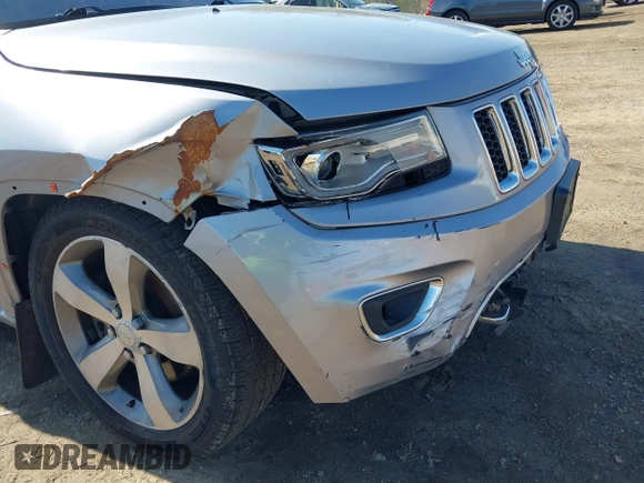 2014 Jeep Grand Cherokee Overland with VIN 1C4RJFCT9EC231840, listed as a IAAI auction lot 42114284 with 170,691 mi miles and . Bid and sale history available at DreamBid. Image 19.