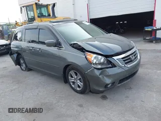 2008 Honda Odyssey Touring с VIN 5FNRL38918B015865, выставлен на аукционе IAAI как лот 42326349 с пробегом 182 642 миль миль и . История ставок и продаж доступна на DreamBid. Изображение 1.